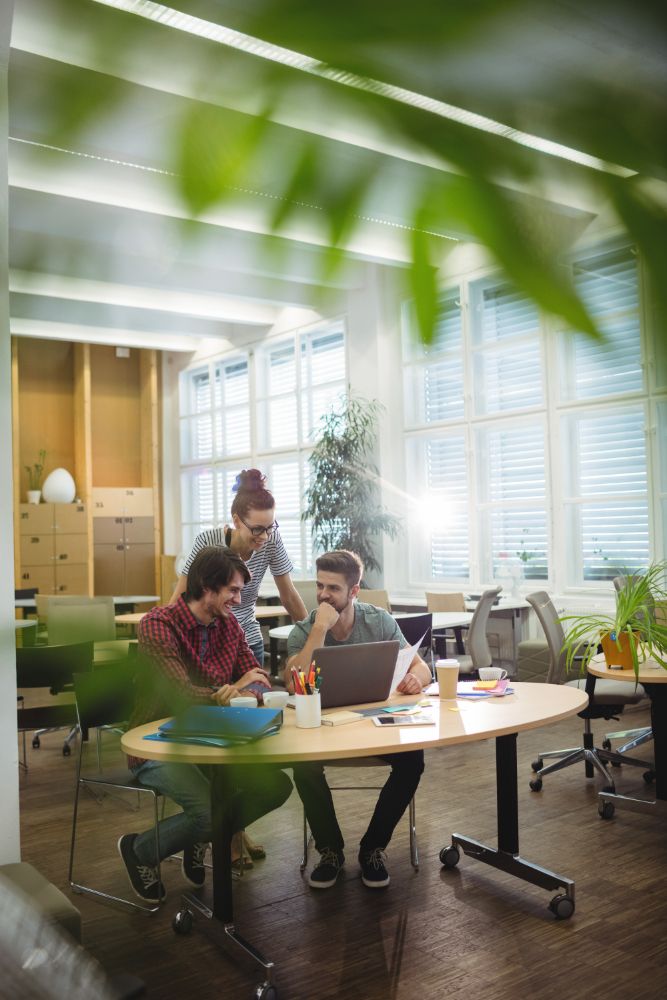Xconcile accounting professionals working in an open-plan office